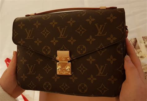 como diferenciar un bolso louis vuitton original|bolso Louis Vuitton usado.